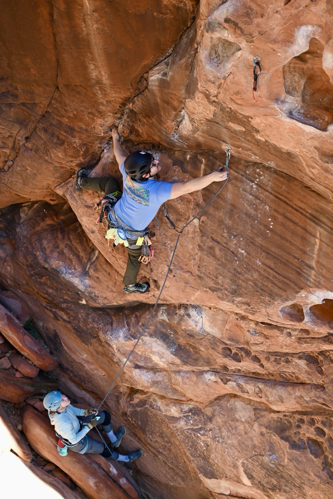 James crushing a lead; Hannah belaying